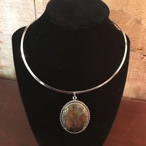 Silver toned collar & pendant